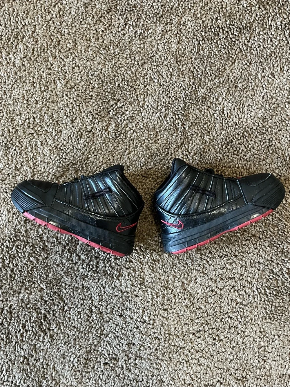 Nike Black Sneakers with Red Accents